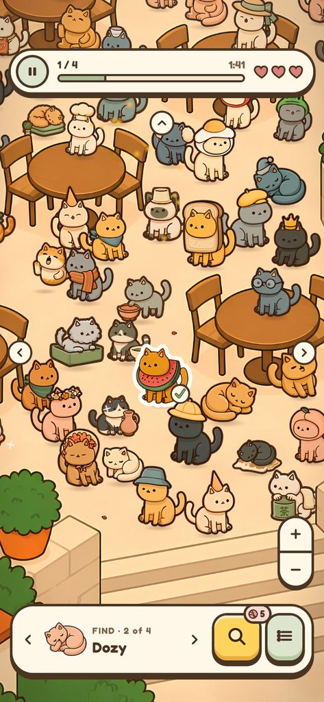 A level on the seaside café terrace, cats around the tables